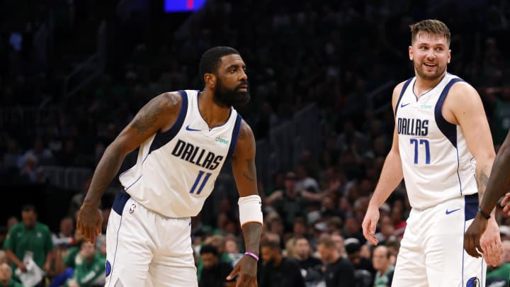 Jun 9, 2024; Boston, Massachusetts, USA; Dallas Mavericks guard Kyrie Irving (11) and guard Luka Doncic (77) react after a play against the Boston Celtics during the first quarter in game two of the 2024 NBA Finals at TD Garden. Mandatory Credit: Peter Casey-USA TODAY Sports Jun 9, 2024; Boston, Massachusetts, USA; Dallas Mavericks guard Kyrie Irving (11) and guard Luka Doncic (77) react after a play against the Boston Celtics during the first quarter in game two of the 2024 NBA Finals at TD Garden. Mandatory Credit: Peter Casey-USA TODAY Sports