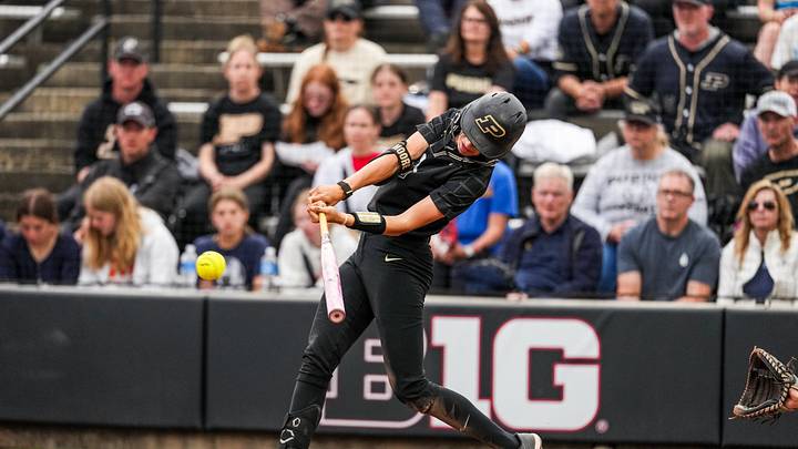 Anna Moore taking an at-bat during the Big Ten Softball Tournament.