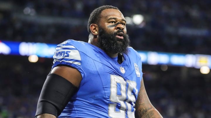 Detroit Lions defensive end Isaiah Buggs (96) walks off the field after recovering the fumble from Denver Broncos quarterback Russell Wilson (3) during the first half at Ford Field in Detroit on Saturday, Dec. 16, 2023. Detroit Lions defensive end Isaiah Buggs (96) walks off the field after recovering the fumble from Denver Broncos quarterback Russell Wilson (3) during the first half at Ford Field in Detroit on Saturday, Dec. 16, 2023.