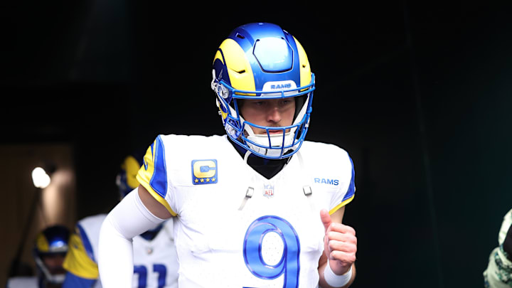 Los Angeles Rams quarterback Matthew Stafford runs onto the field before a game.