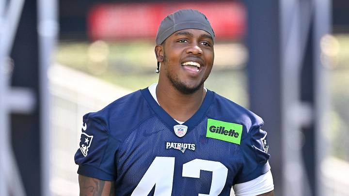Jul 23, 2025; Foxborough, MA, USA; New England Patriots defensive end Bradyn Swinson (43) walks to the practice field for training camp at Gillette Stadium. Mandatory Credit: Eric Canha-Imagn Images