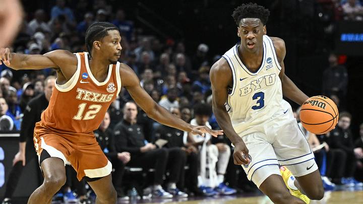 Mar 19, 2026; Portland, OR, USA; BYU Cougars forward AJ Dybantsa (3) drives against Texas Longhorns guard Tramon Mark (12) in the first half during a first round game of the men's 2026 NCAA Tournament at Moda Center. Mandatory Credit: Craig Strobeck-Imagn Images Mar 19, 2026; Portland, OR, USA; BYU Cougars forward AJ Dybantsa (3) drives against Texas Longhorns guard Tramon Mark (12) in the first half during a first round game of the men's 2026 NCAA Tournament at Moda Center. Mandatory Credit: Craig Strobeck-Imagn Images