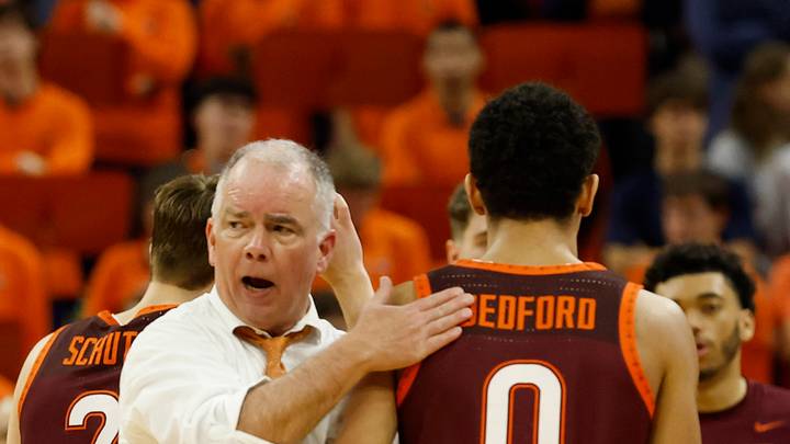 Mar 7, 2026; Charlottesville, Va.; Virginia Tech head coach Mike Young (L) encourages guard Jailen Bedford (0). Mar 7, 2026; Charlottesville, Va.; Virginia Tech head coach Mike Young (L) encourages guard Jailen Bedford (0).