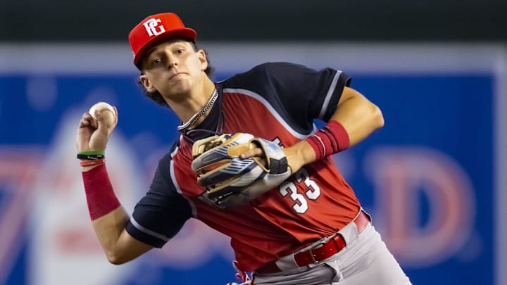 Aug 28, 2022; Phoenix, Arizona, US; West infielder Roch Cholowsky (33) during the Perfect Game All-American Classic high school baseball game at Chase Field. Mandatory Credit: Mark J. Rebilas-Imagn Images