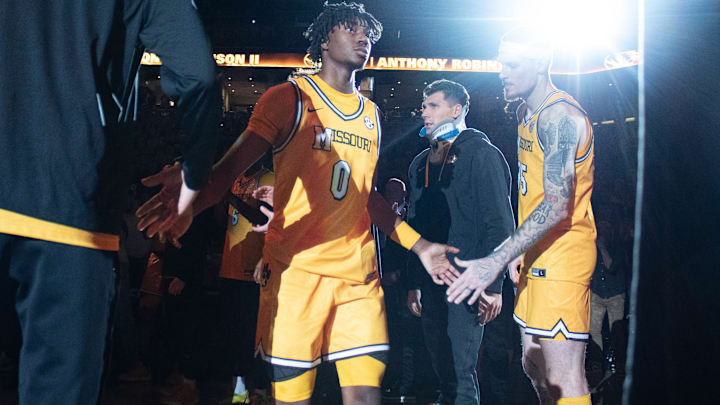 Dec 8, 2024; Columbia, Missouri, USA; Missouri Tigers guard Anthony Robinson II (0) high fives his teammates during player introductions at Mizzou Arena.
