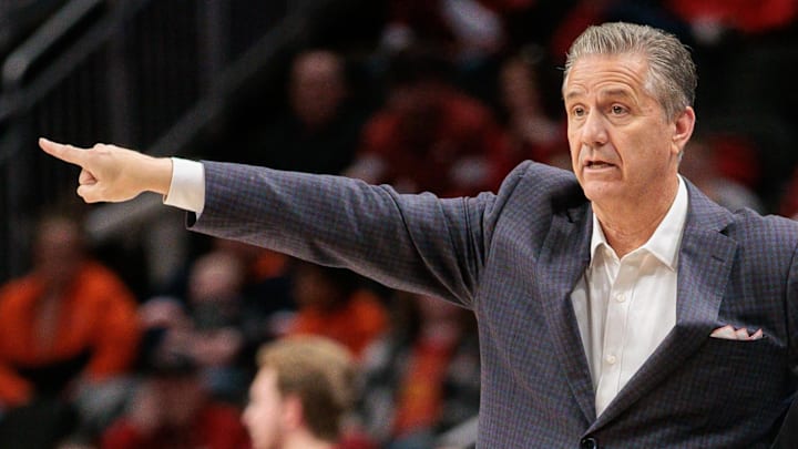 Arkansas Razorbacks coach John Calipari signals to his team during the Thanksgiving Day game against the Illinois Fighting Illini at T-Mobile Center in Kansas City. Illinois beat the No. 19 Razorbacks 90-77. Arkansas Razorbacks coach John Calipari signals to his team during the Thanksgiving Day game against the Illinois Fighting Illini at T-Mobile Center in Kansas City. Illinois beat the No. 19 Razorbacks 90-77.