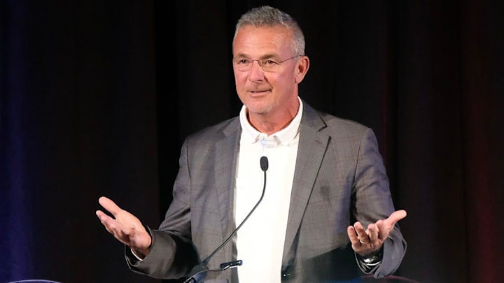Former college football head coach Urban Meyer predicts something in the sport must change its financials as several programs are operating at a steep loss.