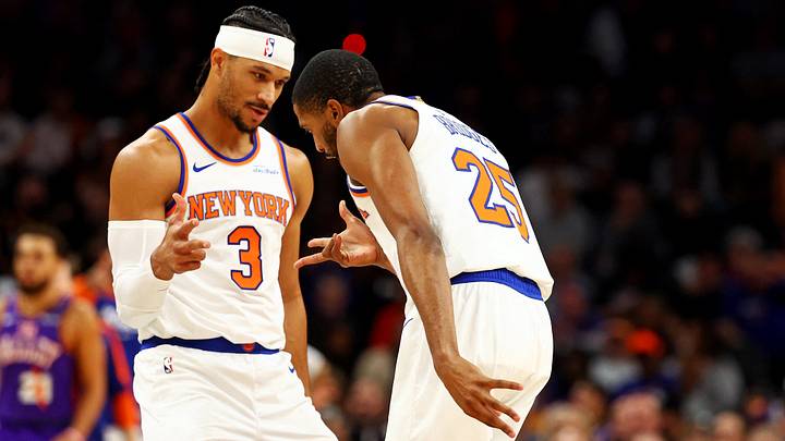 Nov 20, 2024; Phoenix, Arizona, USA; New York Knicks guard Josh Hart (3) and forward Mikal Bridges (25) greet each other before playing against the Phoenix Suns at Footprint Center. Mandatory Credit: Mark J. Rebilas-Imagn Images