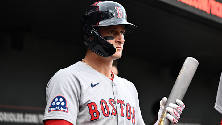 Boston Red Sox outfielder Roman Anthony (19) stands in the dugout before the game between the Baltimore Orioles and the Boston Red Sox at Oriole Park at Camden Yards.