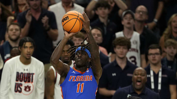 Apr 5, 2025; San Antonio, TX, USA; Florida Gators guard Denzel Aberdeen (11) shoots the ball against the Auburn Tigers during the first half in the semifinals of the men's Final Four of the 2025 NCAA Tournament at Alamodome. Mandatory Credit: Scott Wachter-Imagn Images