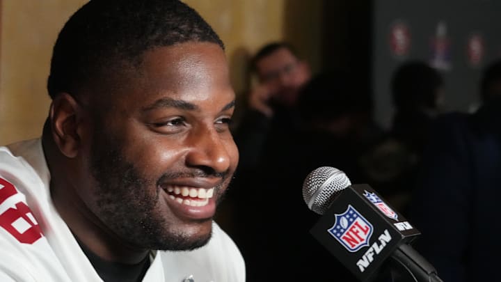 Javon Hargrave smiles during a press conference before the 49ers played the Chiefs in the Super Bowl.