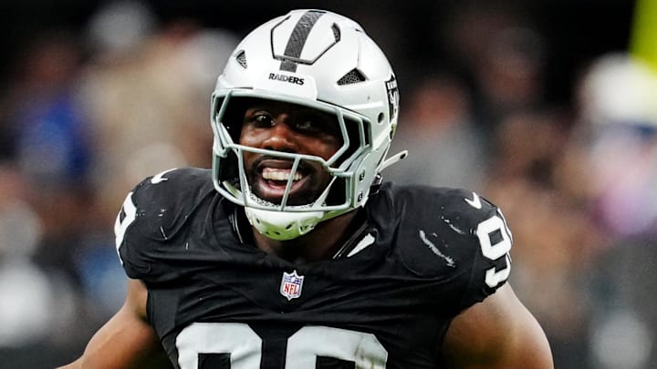 Oct 12, 2025; Paradise, Nevada, USA; Las Vegas Raiders defensive tackle Thomas Booker (99) reacts after a play during the second half against the Tennessee Titans at Allegiant Stadium. Mandatory Credit: Stephen R. Sylvanie-Imagn Images Oct 12, 2025; Paradise, Nevada, USA; Las Vegas Raiders defensive tackle Thomas Booker (99) reacts after a play during the second half against the Tennessee Titans at Allegiant Stadium. Mandatory Credit: Stephen R. Sylvanie-Imagn Images