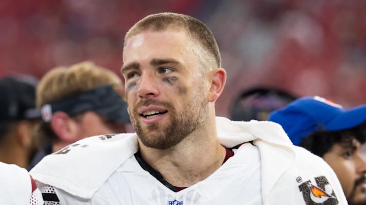 Sep 29, 2024; Glendale, Arizona, USA; Washington Commanders tight end Zach Ertz (86) with quarterback Jayden Daniels (5) against the Arizona Cardinals at State Farm Stadium. Mandatory Credit: Mark J. Rebilas-Imagn Images