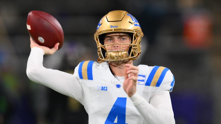 Nov 15, 2024; Seattle, Washington, USA; UCLA Bruins quarterback Ethan Garbers (4) throws the ball during warmups before the game against the Washington Huskies at Alaska Airlines Field at Husky Stadium. Mandatory Credit: Steven Bisig-Imagn Images
