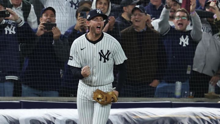 Oct 2, 2025; Bronx, New York, USA; New York Yankees third baseman Ryan McMahon (19) reacts after catching the final out of the game against the Boston Red Sox during game three of the Wildcard round for the 2025 MLB playoffs at Yankee Stadium. Mandatory Credit: Vincent Carchietta-Imagn Images
