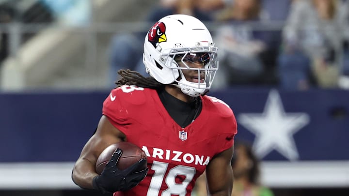Nov 3, 2025; Arlington, Texas, USA; Arizona Cardinals wide receiver Marvin Harrison Jr. (18) scores a touchdown against the Dallas Cowboys in the first half at AT&T Stadium. Mandatory Credit: Kevin Jairaj-Imagn Images