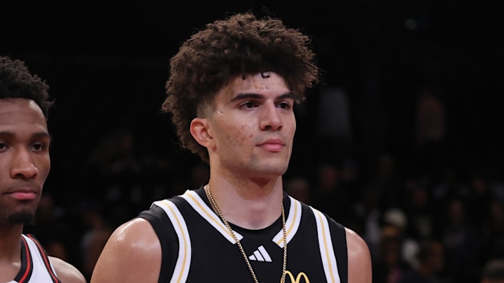 Apr 1, 2025; Brooklyn, NY, USA; McDonald's All American West guard Darryn Peterson (22) and McDonald's All American East forward Cameron Boozer (12) pose for photos after the game at Barclays Center. Mandatory Credit: Pamela Smith-Imagn Images Apr 1, 2025; Brooklyn, NY, USA; McDonald's All American West guard Darryn Peterson (22) and McDonald's All American East forward Cameron Boozer (12) pose for photos after the game at Barclays Center. Mandatory Credit: Pamela Smith-Imagn Images