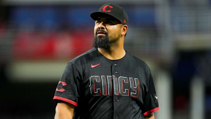 Cincinnati Reds pitcher Tony Santillan (64) walks for the dugout