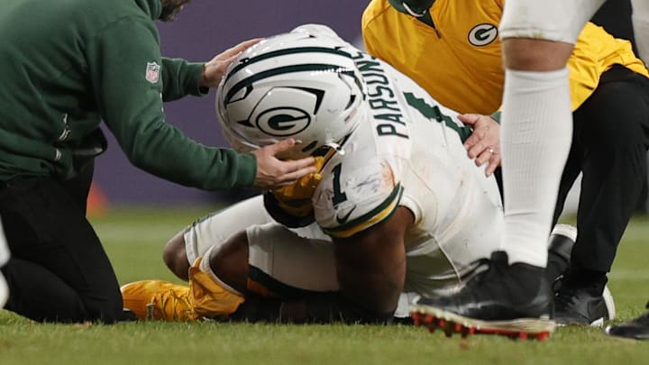 Medical personnel treat Green Bay Packers defensive end Micah Parsons during the loss at Denver. Medical personnel treat Green Bay Packers defensive end Micah Parsons during the loss at Denver.