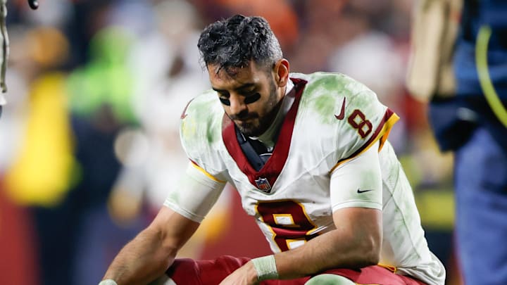 Nov 30, 2025; Landover, Maryland, USA; Washington Commanders quarterback Marcus Mariota (8) reacts after the game against the Denver Broncos at Northwest Stadium. Mandatory Credit: Peter Casey-Imagn Images