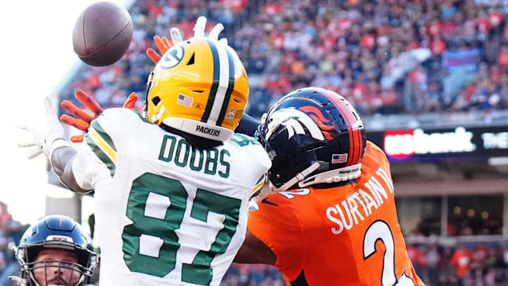 Green Bay Packers receiver Romeo Doubs catches a touchdown pass against Denver Broncos cornerback Pat Surtain II in 2023. Green Bay Packers receiver Romeo Doubs catches a touchdown pass against Denver Broncos cornerback Pat Surtain II in 2023.