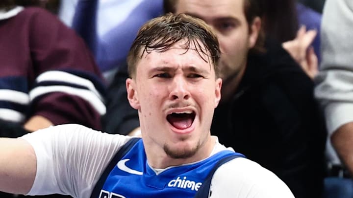 Dallas Mavericks forward Cooper Flagg reacts during the second half against the Washington Wizards. Dallas Mavericks forward Cooper Flagg reacts during the second half against the Washington Wizards.