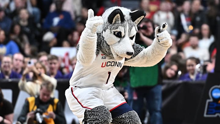 Mar 29, 2025; Spokane, WA, USA; UConn Huskies mascot, Johnathan the Husky performs during the second half of a Sweet 16 NCAA Tournament basketball game against the Oklahoma Sooners at Spokane Arena. Mandatory Credit: James Snook-Imagn Images