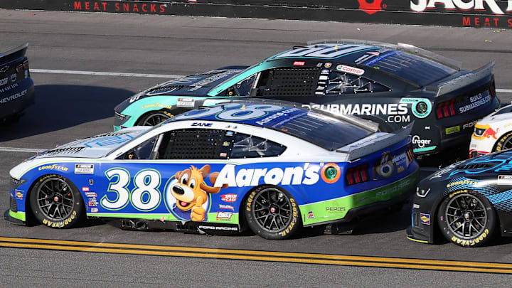 Apr 26, 2026; Talladega, Alabama, USA; NASCAR Cup Series driver Zane Smith (38) races against drivers Ryan Preece (60), Ross Chastain (1), and Shane van Gisbergen (97) during stage three of the Jack Links 500 NASCAR Cup Series race at Talladega Superspeedway