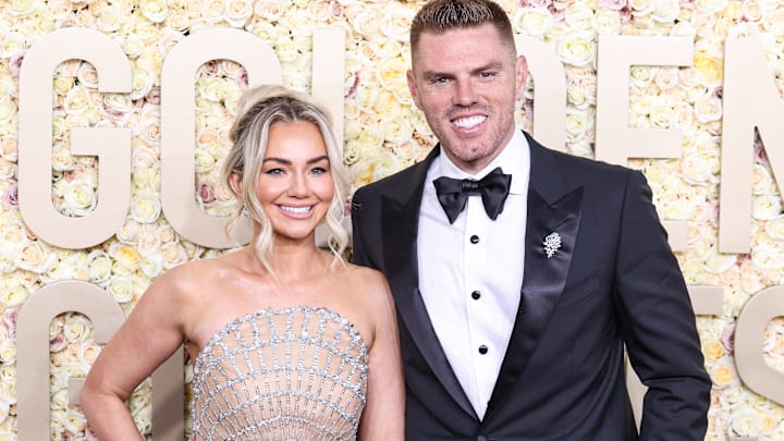 Chelsea Freeman and Freddie Freeman arrive at the 81st Annual Golden Globe Awards.