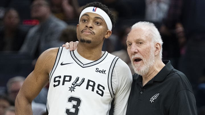 November 24, 2023; San Francisco, California, USA; San Antonio Spurs head coach Gregg Popovich (Right) talks to forward Keldon Johnson (3) during the third quarter against the Golden State Warriors at Chase Center. Mandatory Credit: Kyle Terada-Imagn Images