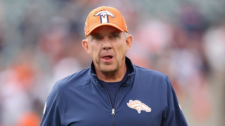 Denver Broncos coach Sean Payton walks on the field.