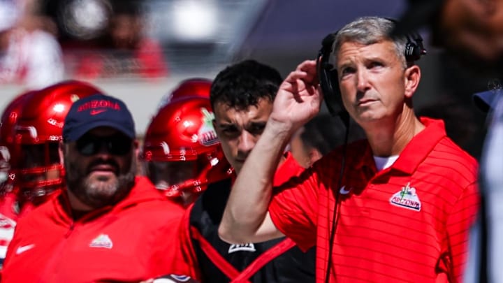 Oct 4, 2025; Tucson, Arizona, USA; Arizona Wildcats head coach Brent Brennan looks up at the scoreboard during the first quarter of the game against the Oklahoma State Cowboys at Arizona Stadium. Mandatory Credit: Aryanna Frank-Imagn Images
