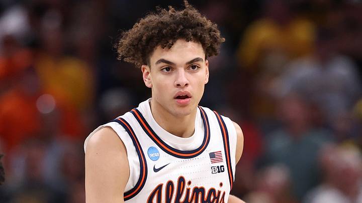Illinois Fighting Illini guard Keaton Wagler (23) controls the ball against Iowa Hawkeyes guard Kael Combs (11) in the first half during an Elite Eight game of the South Regional of the men's 2026 NCAA Tournament at Toyota Center on March 28, 2026 Illinois Fighting Illini guard Keaton Wagler (23) controls the ball against Iowa Hawkeyes guard Kael Combs (11) in the first half during an Elite Eight game of the South Regional of the men's 2026 NCAA Tournament at Toyota Center on March 28, 2026