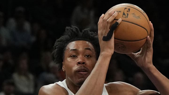 Phoenix Suns forward Cody Martin draws the offensive foul on Toronto Raptors forward Scottie Barnes.