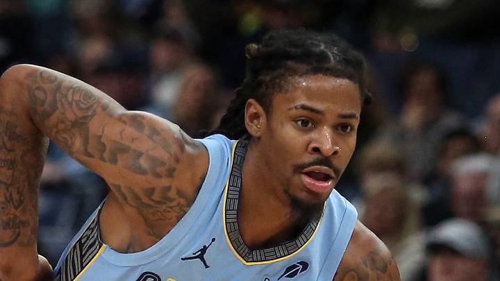 Memphis Grizzlies guard Ja Morant dribbles as Atlanta Hawks forward Corey Kispert. Memphis Grizzlies guard Ja Morant dribbles as Atlanta Hawks forward Corey Kispert.