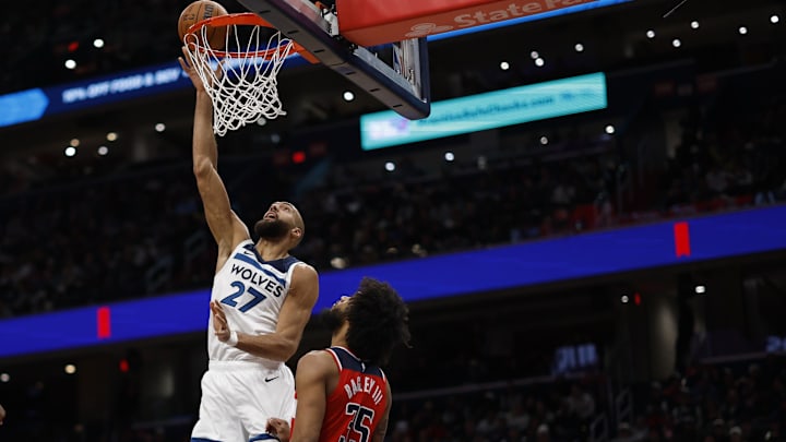 Jan 4, 2026; Washington, District of Columbia, USA; Minnesota Timberwolves center Rudy Gobert (27) shoots the ball over Washington Wizards forward Marvin Bagley III (35) in the third quarter at Capital One Arena.