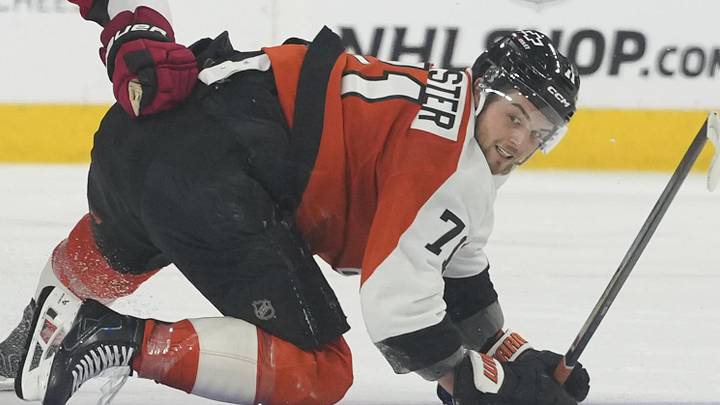 May 9, 2026; Philadelphia, Pennsylvania, USA; Philadelphia Flyers right wing Tyson Foerster (71) reaches for the puck against Carolina Hurricanes center Jordan Staal (11) during the second period in game four of the second round of the 2026 Stanely Cup Playoffs at Xfinity Mobile Arena. Mandatory Credit: James Lang-Imagn Images