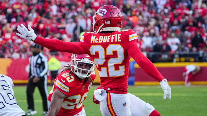 Nov 29, 2024; Kansas City, Missouri, USA; Las Vegas Raiders wide receiver Jakobi Meyers (16) catches a pass as Kansas City Chiefs cornerback Trent McDuffie (22) defends during the first half at GEHA Field at Arrowhead Stadium. Mandatory Credit: Denny Medley-Imagn Images