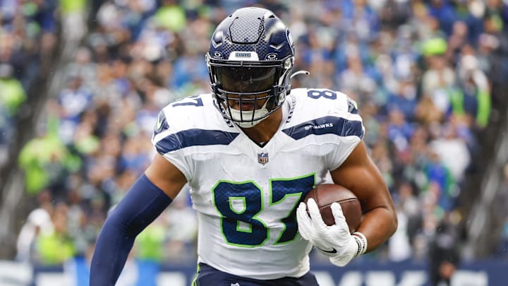 Sep 24, 2023; Seattle, Washington, USA; Seattle Seahawks tight end Noah Fant (87) runs for yards after the catch against the Carolina Panthers during the third quarter at Lumen Field. Mandatory Credit: Joe Nicholson-Imagn Images