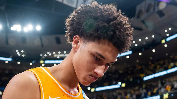 Tennessee forward Nate Ament (10) walks off the court as Michigan players celebrate their Final Four berth behind him after a NCAA Tournament Elite 8 game between Tennessee and Michigan at the United Center in Chicago on March 29, 2026. Tennessee forward Nate Ament (10) walks off the court as Michigan players celebrate their Final Four berth behind him after a NCAA Tournament Elite 8 game between Tennessee and Michigan at the United Center in Chicago on March 29, 2026.