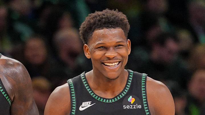 Feb 9, 2026; Minneapolis, Minnesota, USA; Minnesota Timberwolves forward Julius Randle (30) and guard Anthony Edwards (5) laugh after a timeout against the Atlanta Hawks in the fourth quarter at Target Center. Mandatory Credit: Brad Rempel-Imagn Images