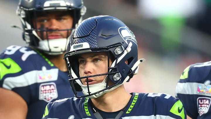 Seattle Seahawks place kicker Jason Myers reacts with teammates after kicking a field goal.