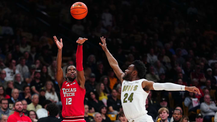 Texas Tech Red Raiders forward Donovan Atwell (12) shoots the ball over Colorado Buffaloes guard Barrington Hargress (24) during the first half at the CU Events Center.