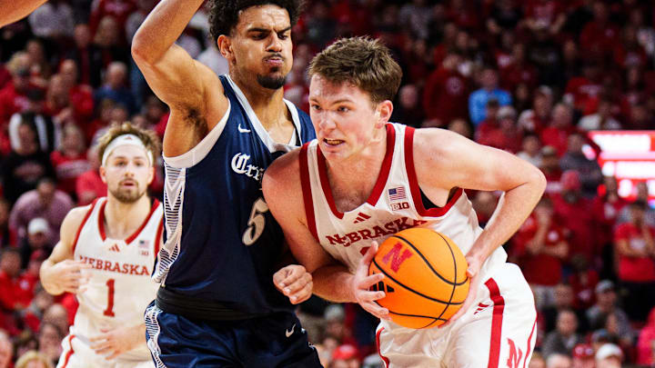 Nebraska forward Pryce Sandfort drives against Creighton guard Nik Graves at Pinnacle Bank Arena.