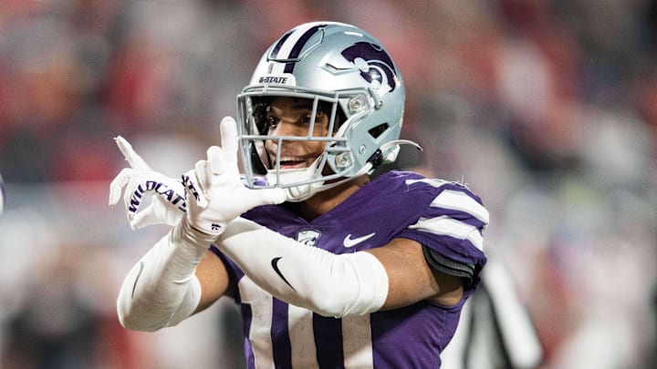 Dec 28, 2023; Orlando, FL, USA; Kansas State cornerback Jacob Parrish (10) celebrates an interception against NC State in the fourth quarter at Camping World Stadium. Mandatory Credit: Jeremy Reper-Imagn Images