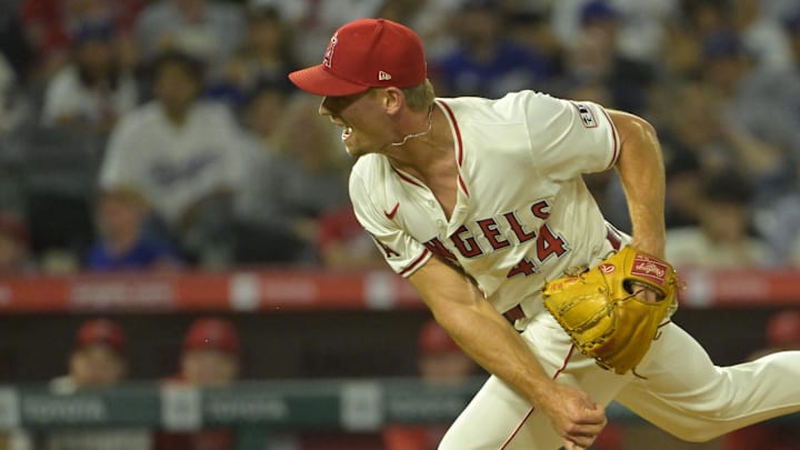 Sep 3, 2024; Anaheim, California, USA;  Los Angeles Angels relief pitcher Ben Joyce (44) strikes out Los Angeles Dodgers shortstop Tommy Edman (25) on a 105.5 mph pitch in the eighth inning at Angel Stadium. Mandatory Credit: Jayne Kamin-Oncea-Imagn Images