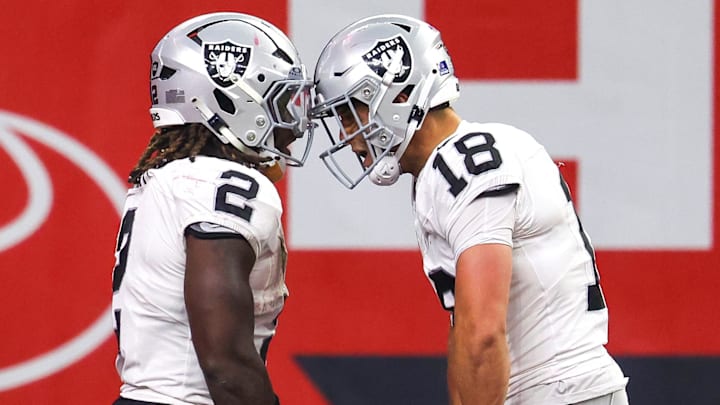 Dec 21, 2025; Houston, Texas, USA; Las Vegas Raiders wide receiver Jack Bech (18) celebrates running back Ashton Jeanty (2) touchdown reception against the Houston Texans in the second half at NRG Stadium. Mandatory Credit: Thomas Shea-Imagn Images