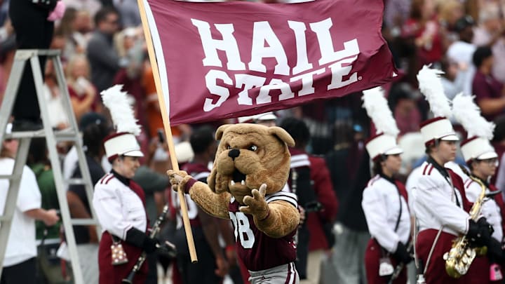 Mississippi State Bulldogs mascot Bully waves a “Hail State” flag prior to the game against the Texas Longhorns at Davis Wade Stadium at Scott Field. Mississippi State Bulldogs mascot Bully waves a “Hail State” flag prior to the game against the Texas Longhorns at Davis Wade Stadium at Scott Field.