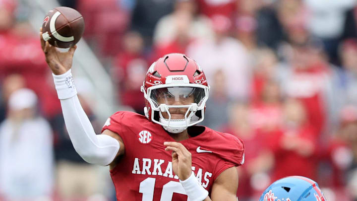 Arkansas Razorbacks quarterback Taylen Green (10) passes in the first quarter against the Ole Miss Rebels at Razorback Stadium.