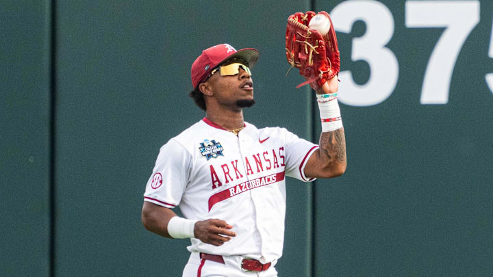 Arkansas Razorbacks center fielder Justin Thomas Jr. (4) catches for an out against the LSU Tigers during the first inning at Charles Schwab Field.